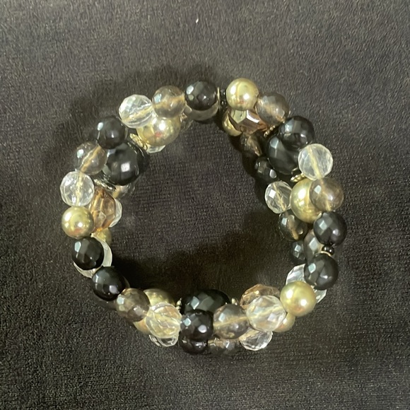 Stretch bracelet with 3rows of black, silver and clear beads - Picture 2 of 3